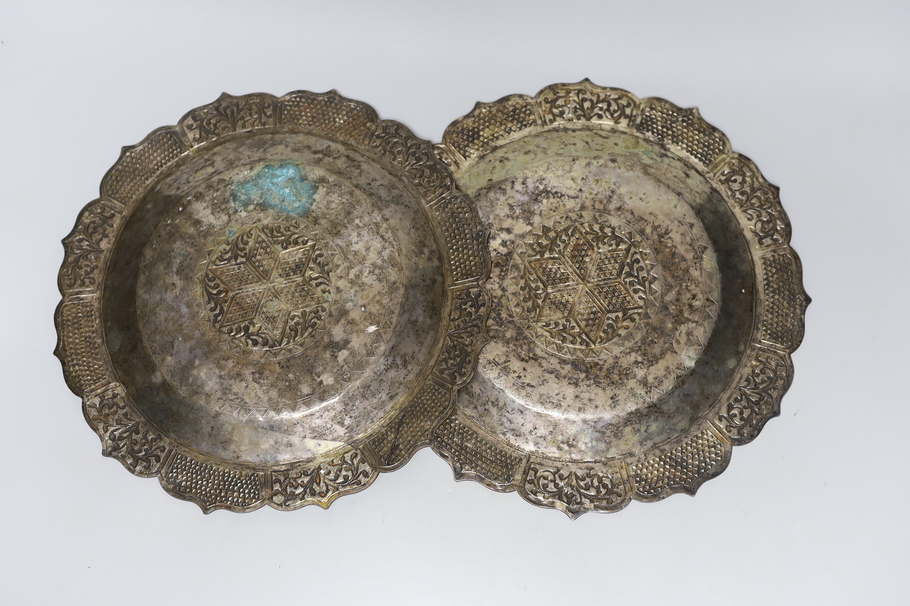 Two Asian base metal plates, 29.5cm diameter